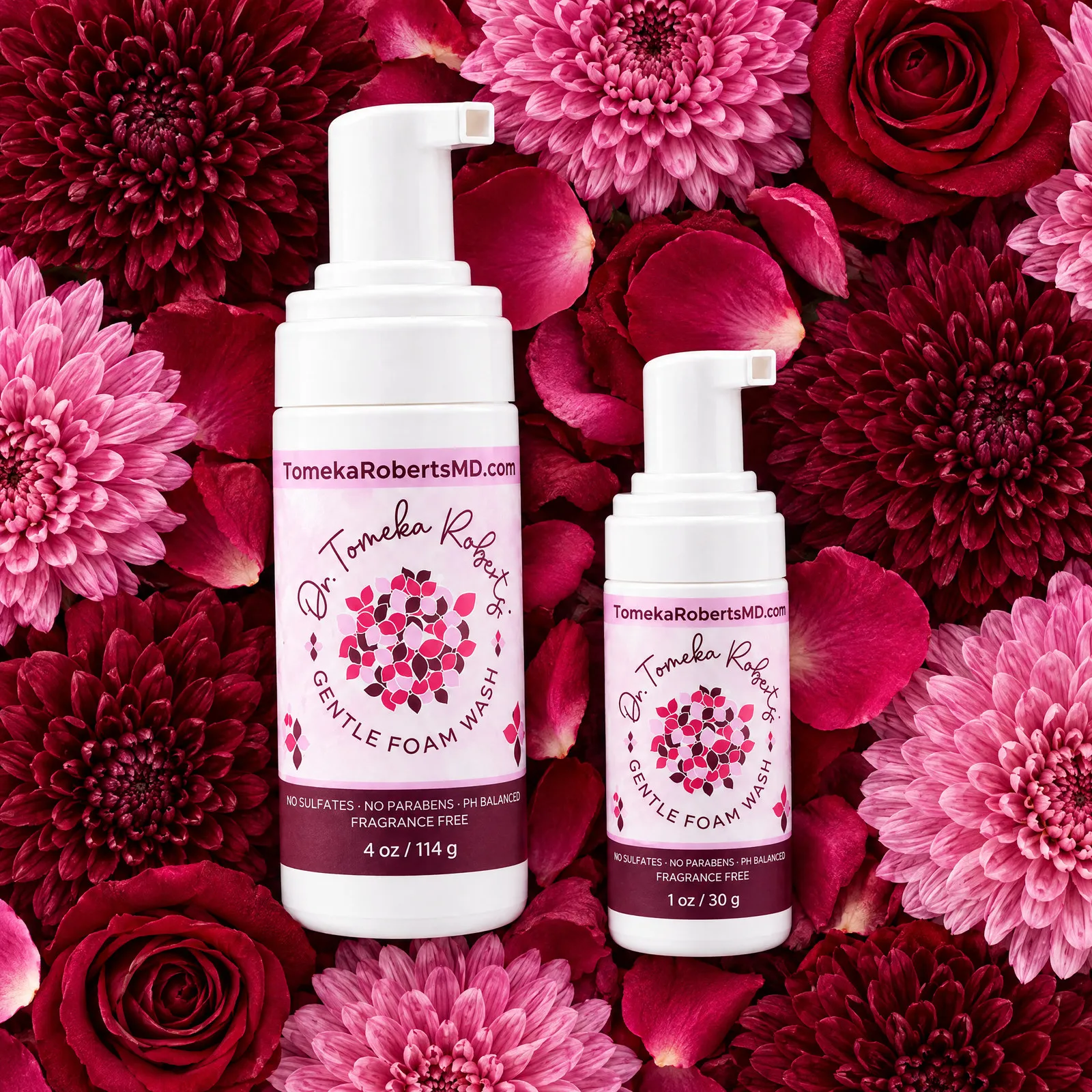 Both Fragrance-Free sizes on a bed of pink and crimson blooms