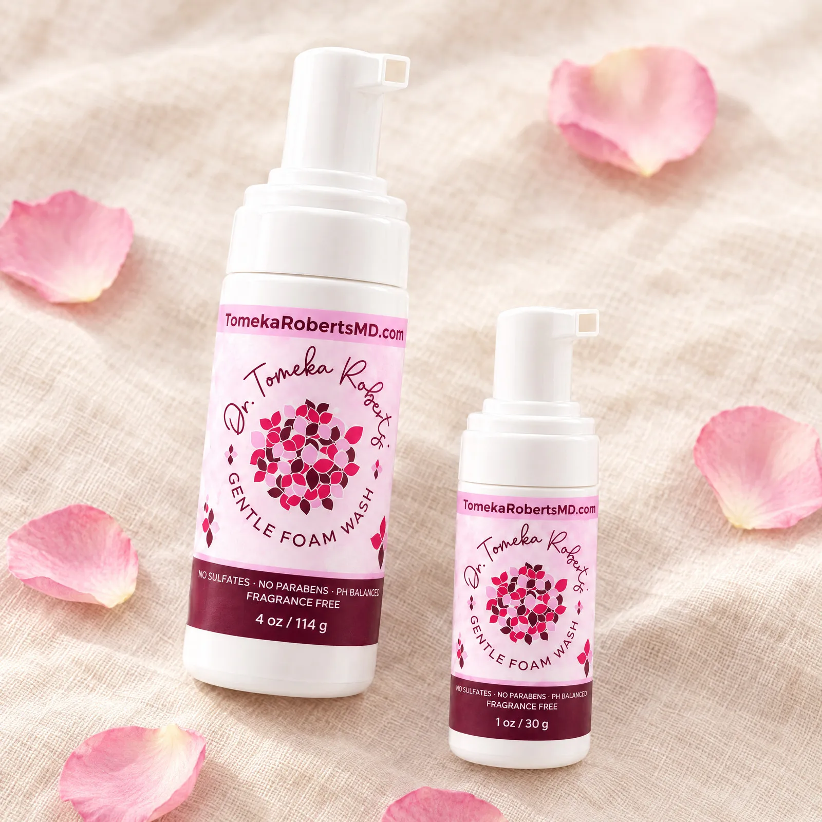 Both Fragrance-Free sizes on pale linen scattered with rose petals