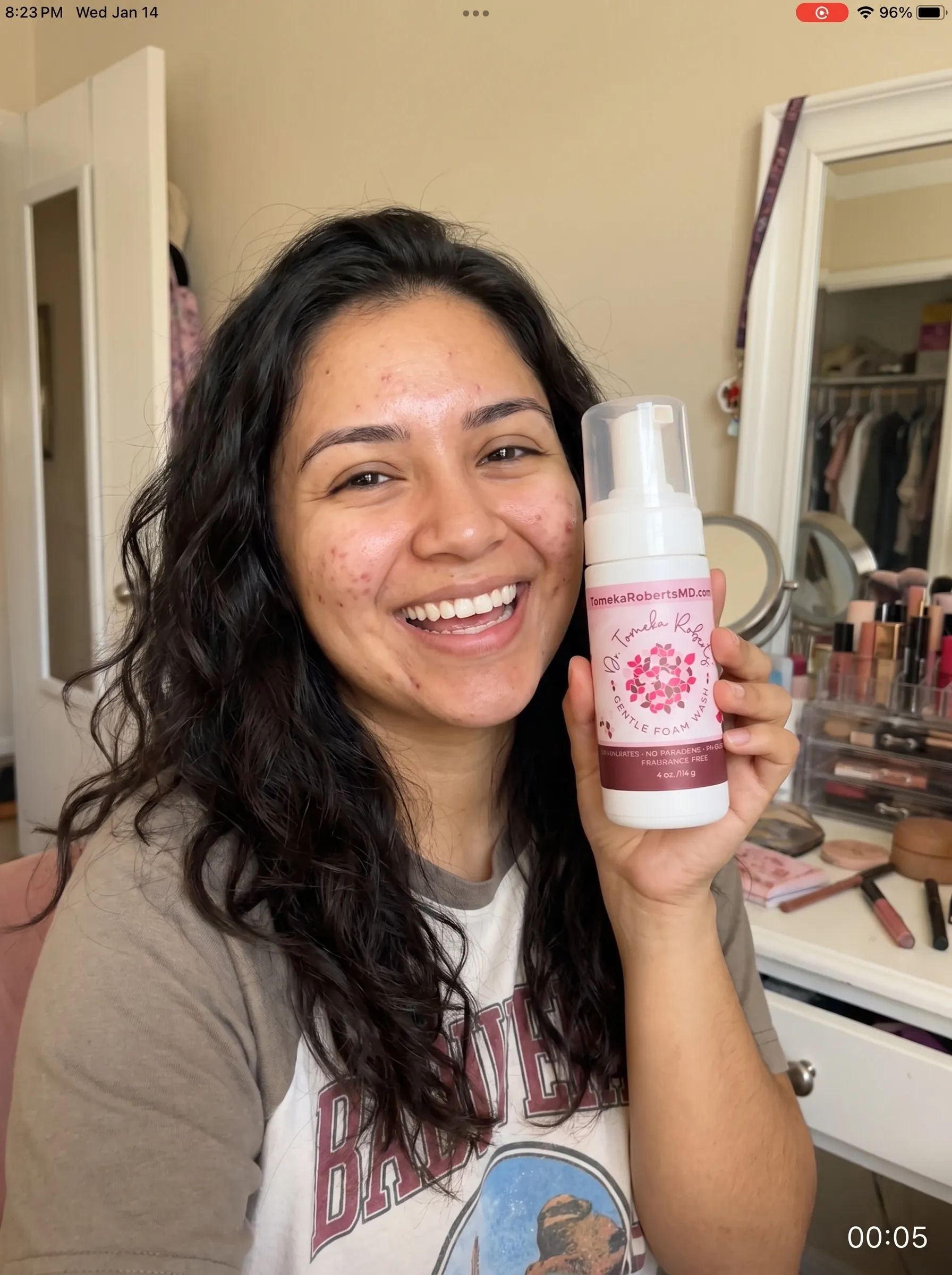 Gabby holding the Gentle Foam Wash